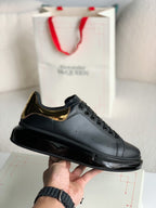 Alexander McQueen Oversized Black Gold Sneakers