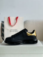 Alexander McQueen Oversized Black Gold Sneakers