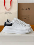 Alexander McQueen Men’s White Leather Oversized Sneakers with Black Heel Tab