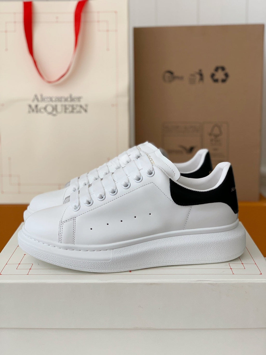 Alexander McQueen Men’s White Leather Oversized Sneakers with Black Heel Tab