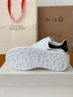 Alexander McQueen Men’s White Leather Oversized Sneakers with Black Heel Tab