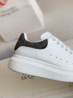 Alexander McQueen White Leather Oversized Sneakers with Black Suede Heel Tab