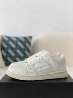 Amiri Skel Top Low – Triple White Grained Leather
