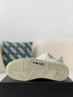 Amiri Skel Top Low – Triple White Grained Leather