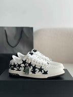 Amiri Star Burst Low – White Grained Leather & Black Stars