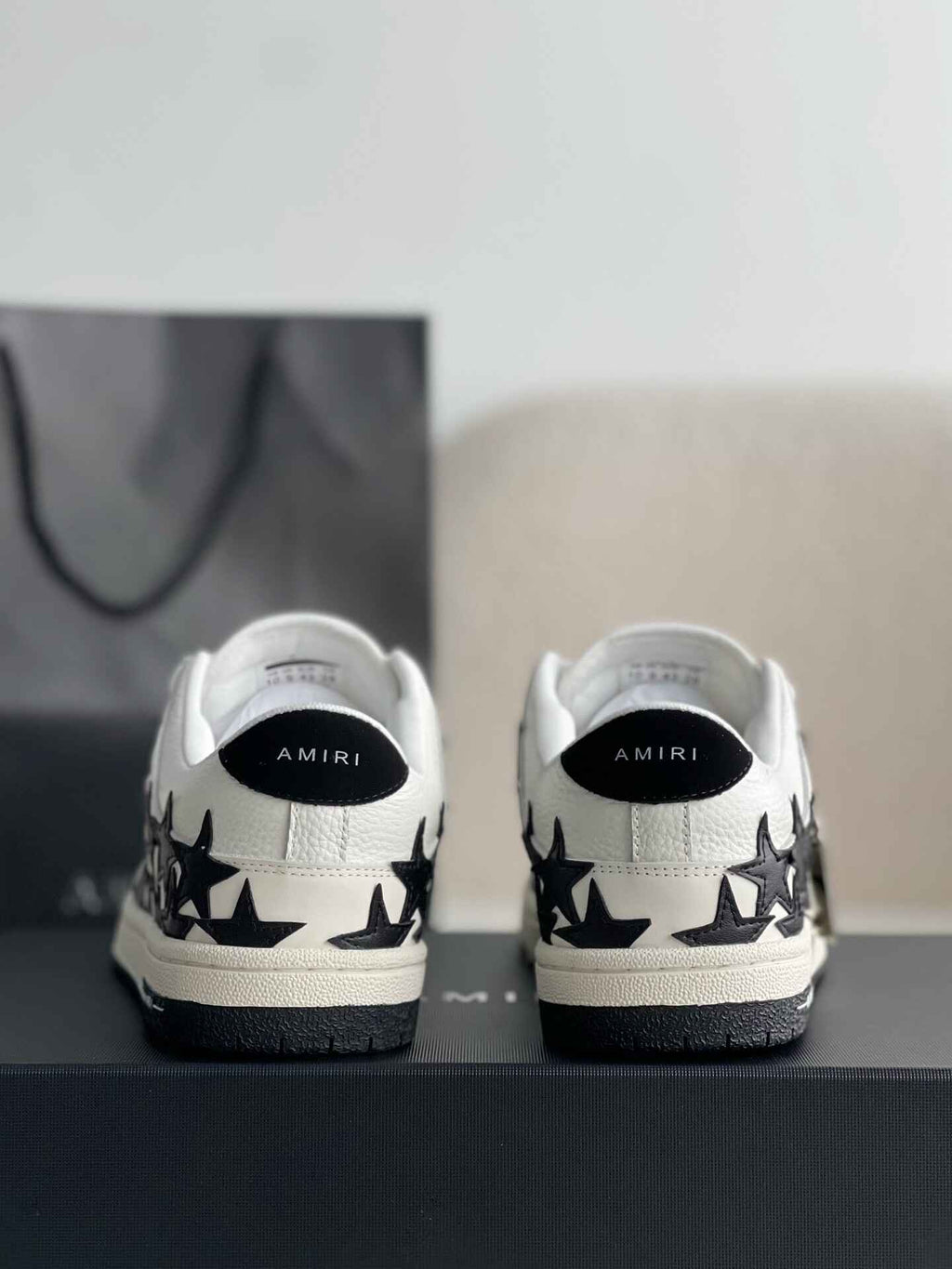 Amiri Star Burst Low – White Grained Leather & Black Stars