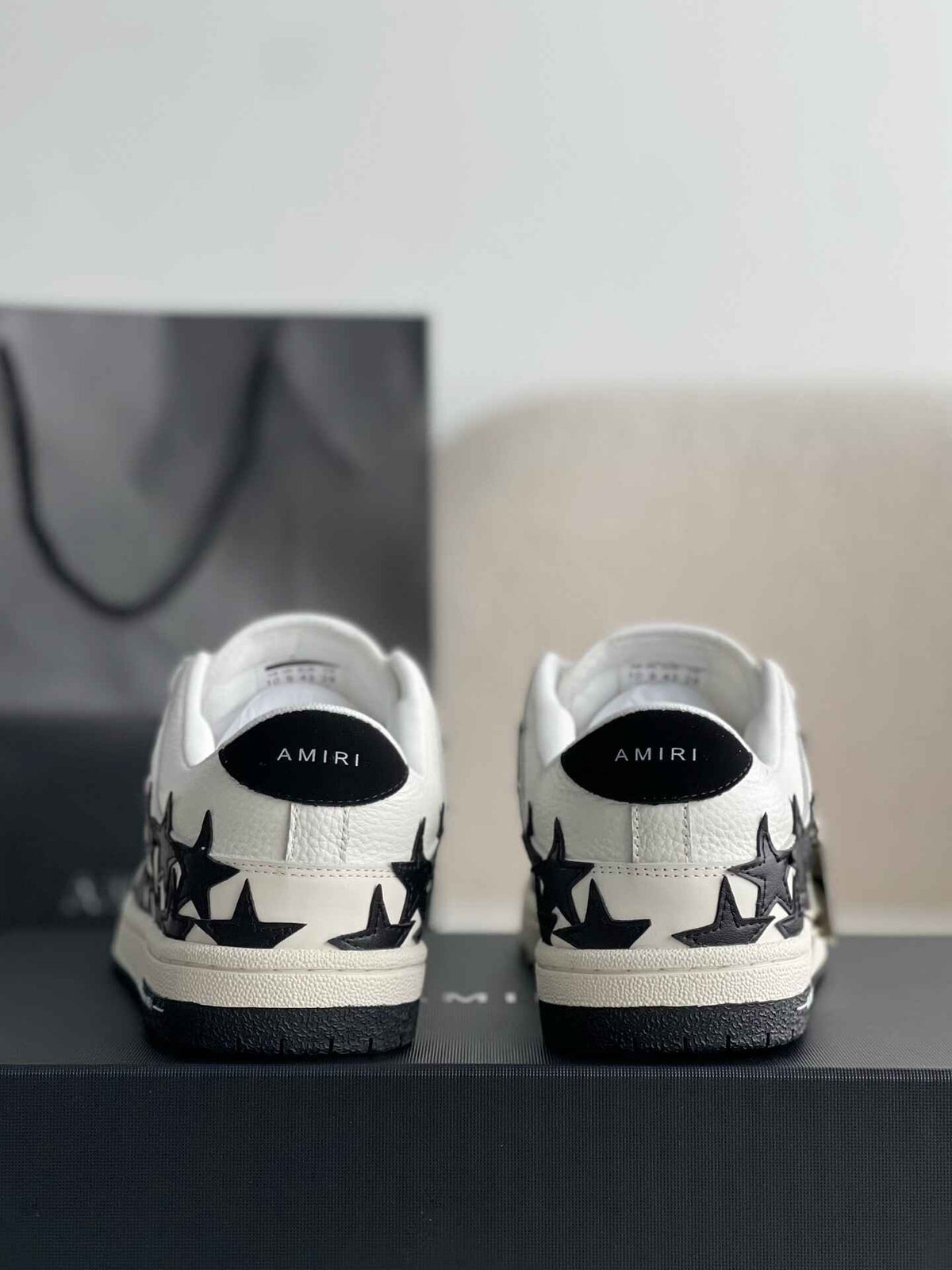 Amiri Star Burst Low – White Grained Leather & Black Stars