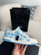 Amiri Star Burst Low – White Grained Leather & Sky Blue Stars