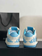 Amiri Star Burst Low – White Grained Leather & Sky Blue Stars