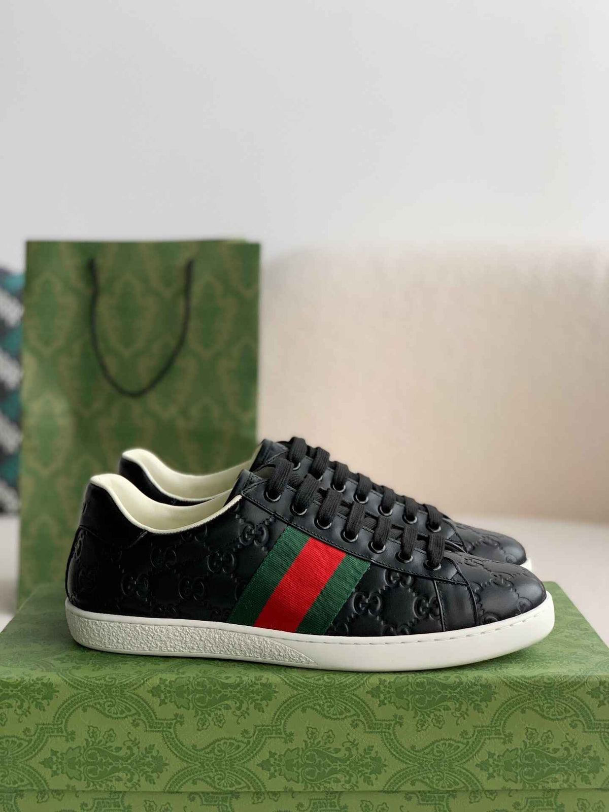 Gucci Ace Sneaker – Black GG Embossed Leather with Green & Red Web