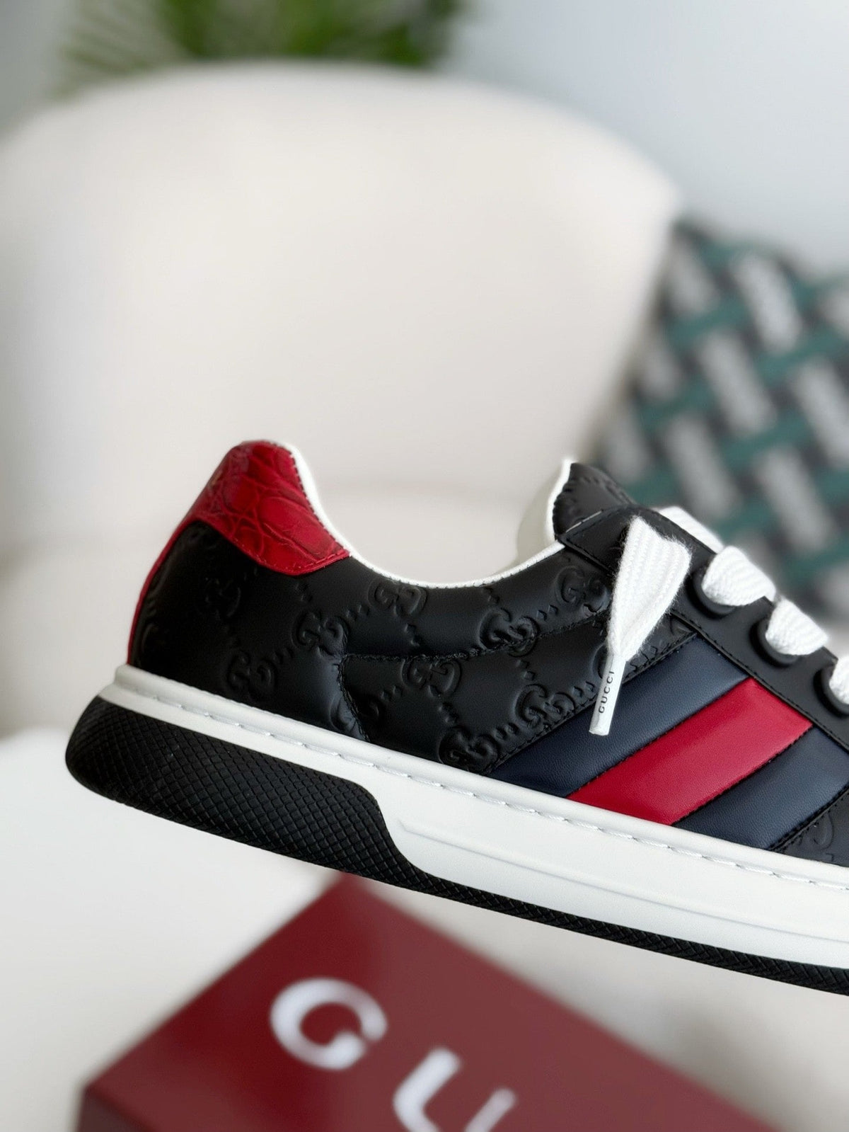 Gucci Re-Web Sneaker – Black GG Embossed Leather with Red & Blue Web