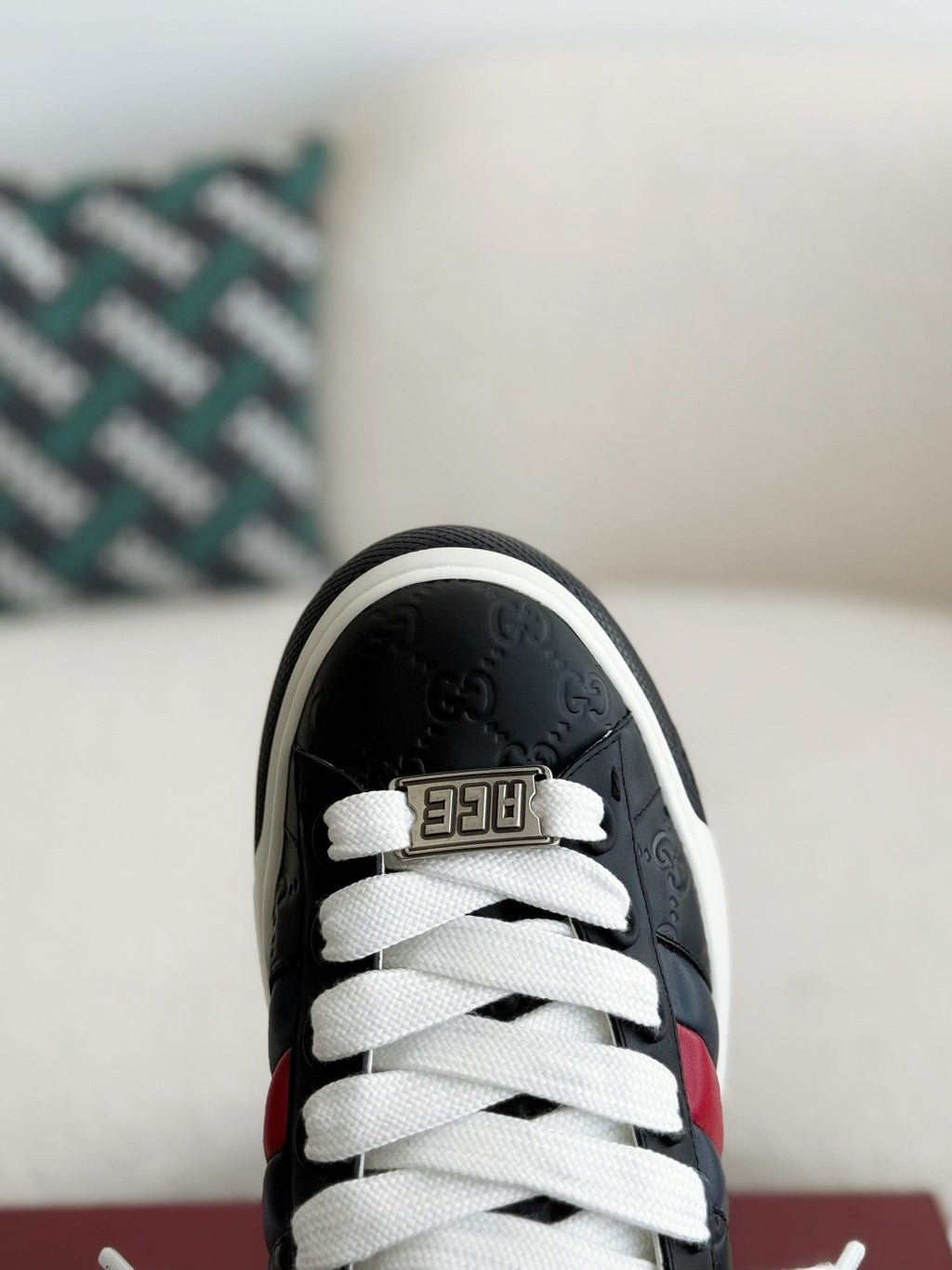 Gucci Re-Web Sneaker – Black GG Embossed Leather with Red & Blue Web