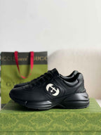 Gucci Rhyton Sneaker – Black Leather with White Interlocking G