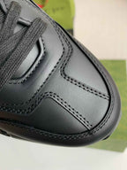 Gucci Rhyton Sneaker – Black Leather with White Interlocking G