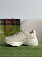 Gucci Rhyton Sneaker – Ivory Leather with Blue Interlocking G
